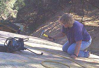 Working on Roof Panels with New Hammer