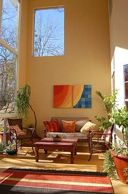 With bold colors and shapes, abstract art works best in a modern home interior.