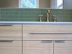 Custom cabinets will give your bathroom an upscale designer look; bamboo is becoming more popular as a cabinet material.