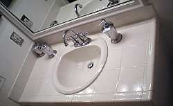 A ceramic tile countertop is always a timeless and affordable material that works in almost any bathroom remodel!
