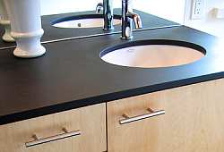 For an alternative to granite or marble countertops, you could also use Paperstone, Soapstone or a laminated stone product.