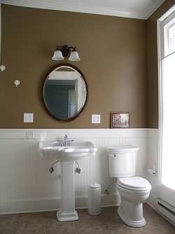 Bathroom Design Gallery on Sink And White Wainscoting Give This Country Bathroom Style And Flair