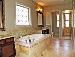 Mixing materials, patterns and forms will give your elegant bathroom a feeling of luxury and relaxation.