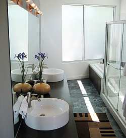 Avoid overcrowding your countertops. You should only install dual sinks if you have enough space for the arrangement to be balanced and in scale with the rest of the space.