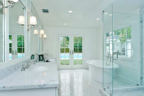 Good overall ambient light is important in a bathroom, where many activities will be task driven and require good, bright light without too many shadows.