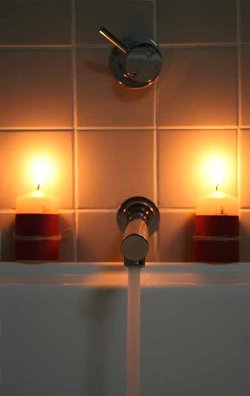 Overall ambient lighting and good task lighting are requirements in the bathroom, but use accent lighting to give your bathroom a more stylish look.