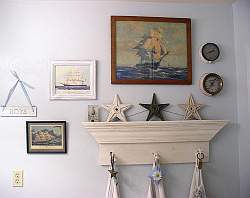 A nautical theme is easy to do in your boys bathroom and you have lots of options, from beach stuff to ships, pirates and surfing.