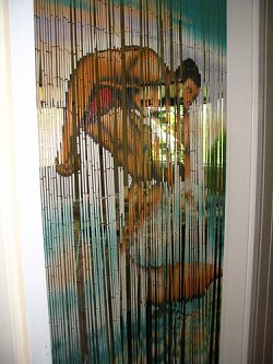 A bead curtain will go nicely in the door to a closet or adjoining room.