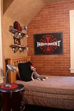 From a creative standpoint, you have plenty of options when planning your room with a skateboard theme. How about turning a couple of old boards into display shelving?