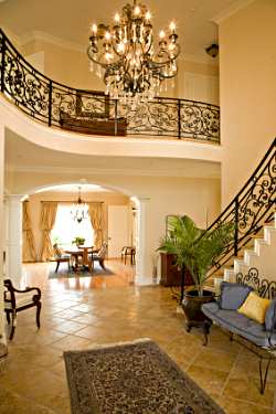 Chandeliers add interest and warmth to a great foyer or entry way. Selecting the right size and style for your home is key.