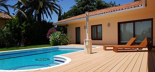 Composite deck material such as this Tech-Wood product are low maintenance and look almost as good as real wood decking!