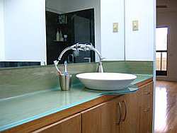 Sleek lines and smooth surfaces are characteristic of contemporary bathroom design.