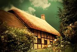 Thatched roofs, tudor siding and passalong plants make cottage style lanscaping timeless and pastoral.