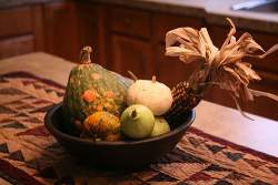 Handcrafted items like this table runner add authenticity to your country decor.