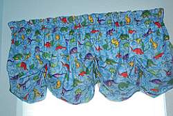 It is cheap and easy to sew using a dinosaur-patterned fabric for your dino themed bedroom.