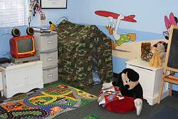 Disney characters make a great playroom theme as shown in this playroom designed by Disney.