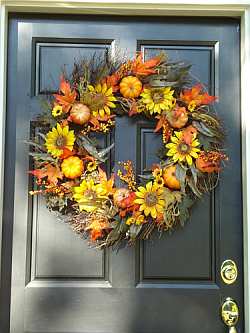 Fall flower wreath gives arriving guests a festive welcoming at your front door!