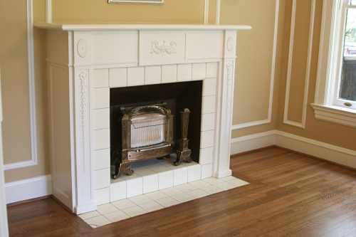 Update your existing fireplace to match your home decor, especially if it is the central focal point of a room. Materials commonly used in building fireplace hearths and mantels include wood, brick, copper, ceramic tiles, marble and natural stone. A fireplace insert can also help increase heating efficiency.