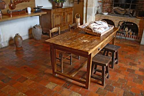 Rustic, yet eloquent, the interior of this French country castle reveals the rustic, charming furniture, rough textures and warm tones characteristic of the French country style.