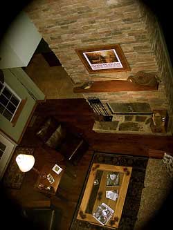 A view from above; this rustic great room feels warm and inviting. Photo by longmountainlodge.