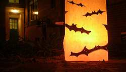 Use scary candles, colored lights, illuminaries and votives to really set the Halloween mood in your home.