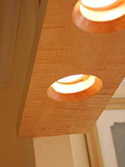 These beveled lights, installed in a soffit, provide nice accent lighting and contribute to the overall ambient light level.