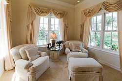 Traditional living or sitting rooms lend themselves to formal drapes, which natually frame picture windows.