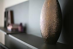 Decorations are kept to a minimum and carefully chosen for quality over quantity! Photo by architectural photography.