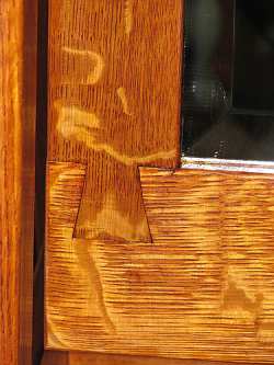 Mission style furniture and decor emphasizes craftsmanship as shown in the detail of this fine dovetail joint.