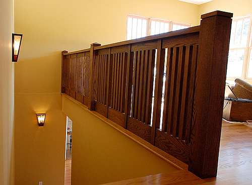 Clean lines and fine joinery work, made from quarter-sawn pieces of oak are typical of Mission style as this bannister railing shows.