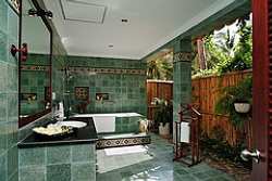 If you prefer a little more privacy, a nice option is the open-air bathroom, which can be left open or closed off from the outdoors.