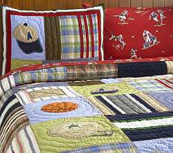 Junior Varsity pillows and bed quilt can work in either a girl or boy bedroom. Available at Pottery Barn Kids.