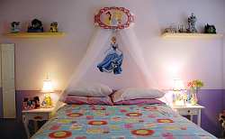 Its easy to transform any girls bedroom into a princess bed with a simple canopy or headboard treatment.