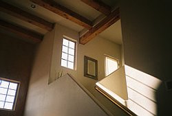 Open beams and angular design typify the interior of Pueblo Revival homes.