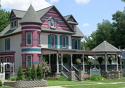 Adorned with many architectural features and trim, Queen Anne style homes may be painted on the exterior with bright, contrasting colors.