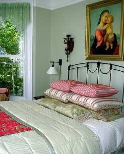 Art in the bedroom is always a matter of personal taste. Choose artwork you and your partner both feel comfortable with.