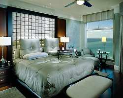 Cool tones give the bedroom a feeling of peace and tranquility.