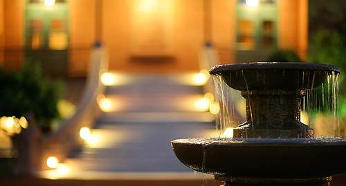 Landscaping features such as lighting and a small fountain will add interest, color and movement to your small garden or yard.