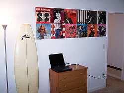 A scrap wall is a great way to add personalized surfing and beach-themed art work to your walls without spending anything!