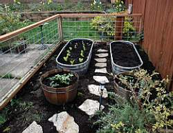 Enclose your vegetable garden to frame it and also keep pets and animals out.